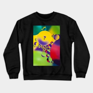 Colorful close up of oil drops in water Crewneck Sweatshirt